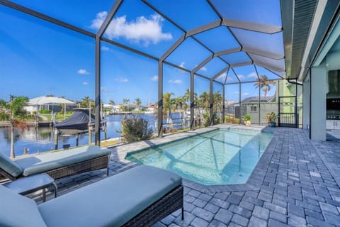 Sparkling private pool overlooking water (Boat lift not available)