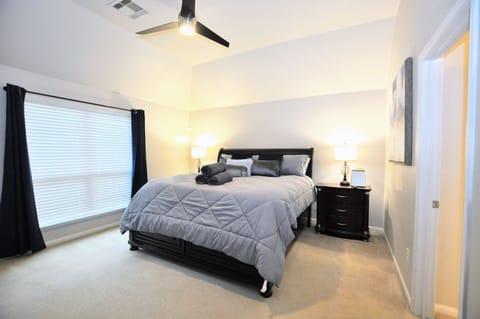 Master bedroom with TV and King bed