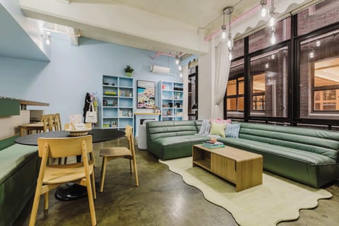 LIVING SPACE: Open and spacious with 4m ceilings, expansive windows, and a cosy electric fireplace. This vibrant hideaway captures the essence of Melbourne charm. A colourful retreat made for slow mornings and soft landings after lively nights out.