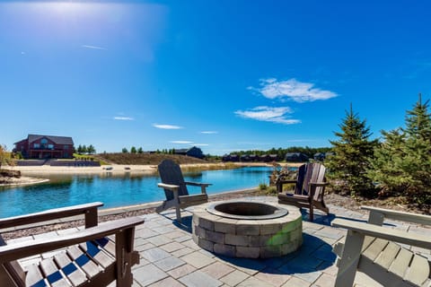 Fire pit area overlooking the beach area. We provide firewood for your stay.