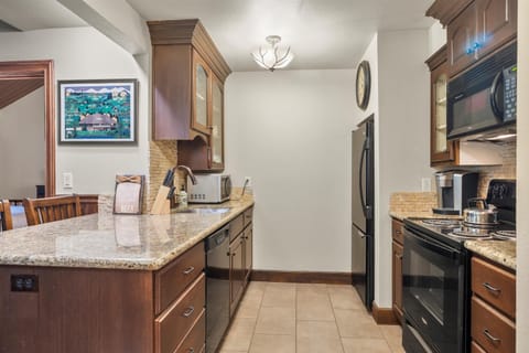 The updated kitchen offers ample space & all the comforts of home
