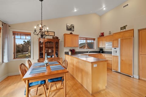 Gather for meals together at the dining table, with seating for 4