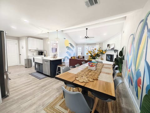 Gather for meals together at the dining table, with seating for 8