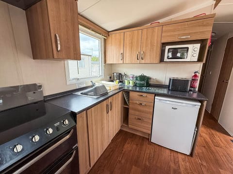 a functional kitchen space designed for your convenience on your Uk holiday,