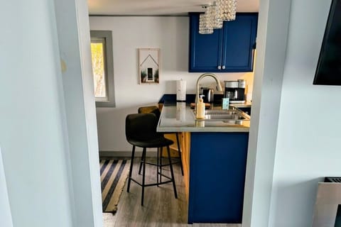 Tranquil lakeside retreat step into kitchen from living room