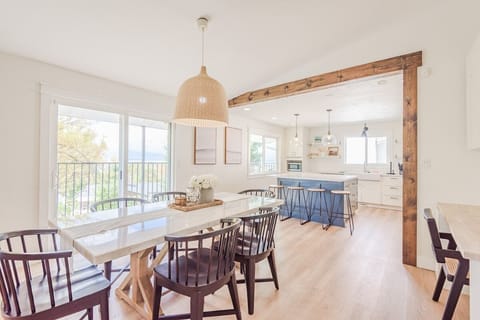 Dine with a view: Enjoy meals in the spacious dining area, just steps from the fully equipped kitchen!