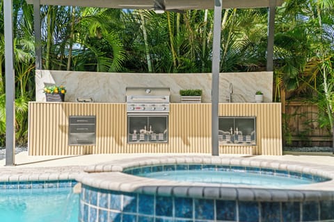 Take a dip in this sparkling pool, complete with a stylish waterfall