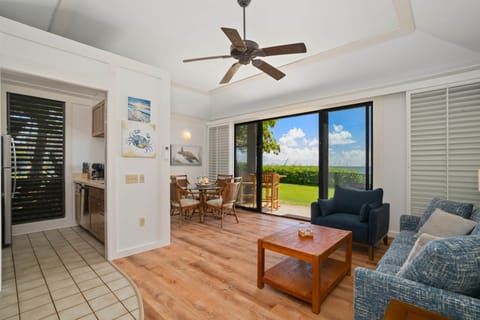 Breathe in the ocean air as sunlight fills your living space — dine, relax, and take in the endless 