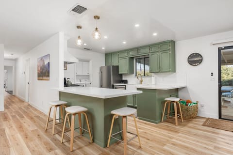 Kitchen with additional bar seating