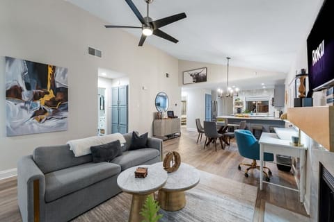 Living Room: Bright space with modern decor, perfect for relaxation or gathering with family