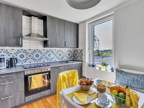 Kitchen, Interior Design, Flooring, Countertop, Kitchen Appliance, Major Appliance, Floor, Furniture, Cabinetry, Room