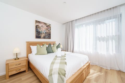 A comfortable queen-size bed with soft, professionally laundered linen for a restful night`s sleep.