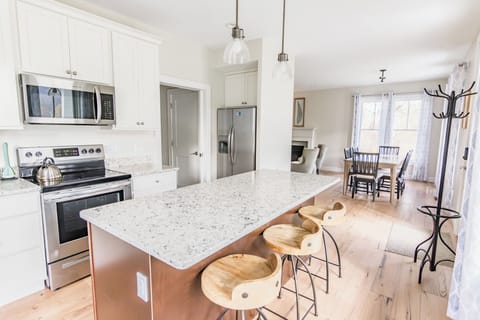 Easy flow between kitchen, dining, and living areas