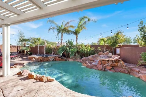 Unwind in style by the waterfall pool, your private oasis of relaxation.