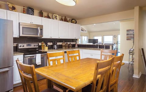 The kitchen is fully stocked for all your cooking needs.