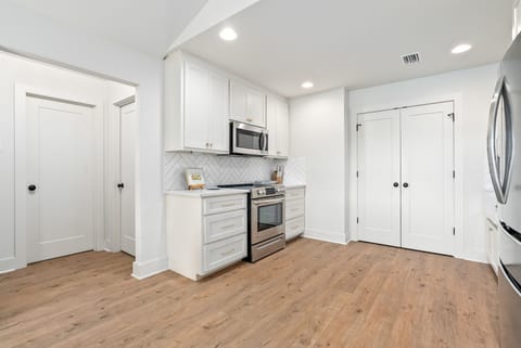 View of top floor microwave and stove