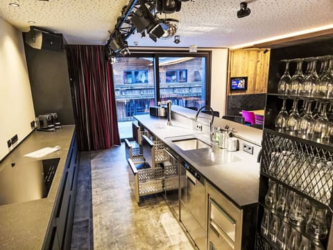 Interior Design, Lighting, Ceiling, Flooring, Furniture, Countertop, Kitchen, Light Fixture, Cabinetry, Chair