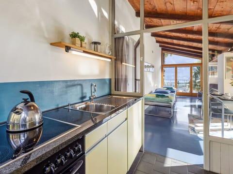 Tap, Cabinetry, Property, Countertop, Sink, Plumbing Fixture, Kitchen Sink, Wood, Kitchen, Interior Design