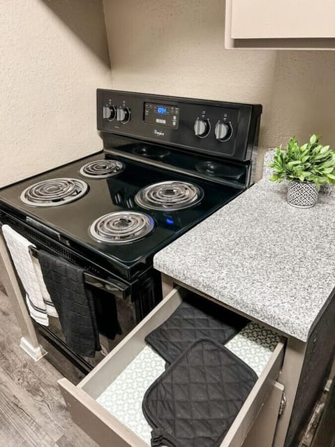 Prepare delicious meals with ease using the reliable stovetop oven in this kitchen.