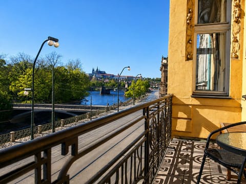 Terrace: Sip coffee while admiring stunning views of the Vltava River and Prague Castle!