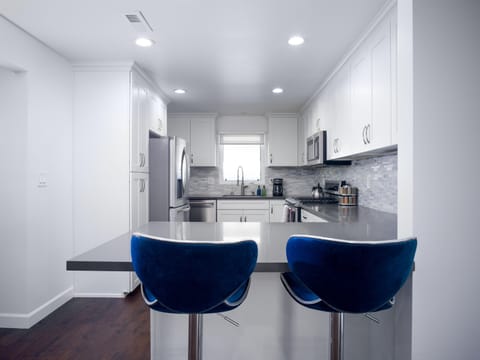 Sip coffee at the bar together