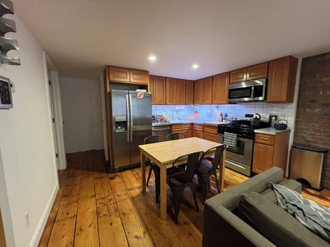 Kitchen looking toward bedroom doors