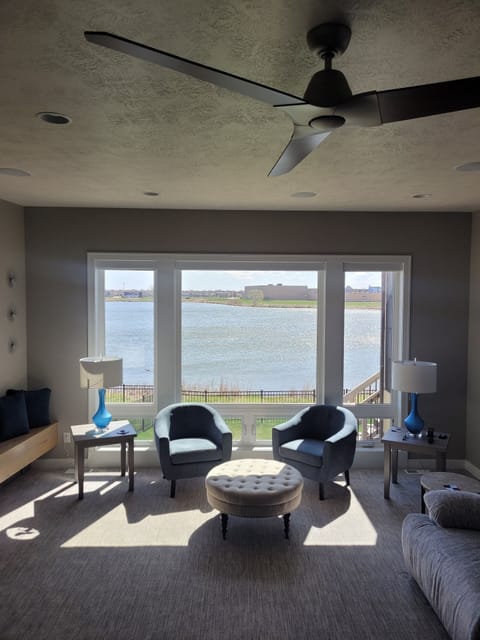 Main level living area with pond view
