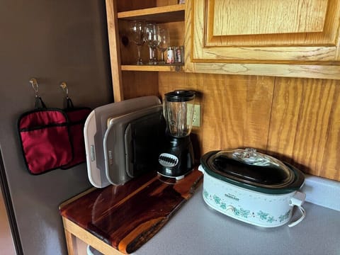 Appliances and dishware, and lots of pots and pans to cook up a storm!