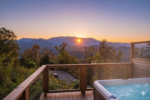 Private deck with hot tub and mountain views of Mt. LeConte