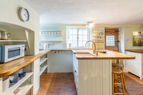 Ground floor: Kitchen with breakfast bar seating