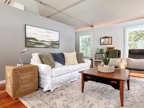 Comfy living room with 55' flat screen TV for watching football or your favorite movie on a rainy day. 