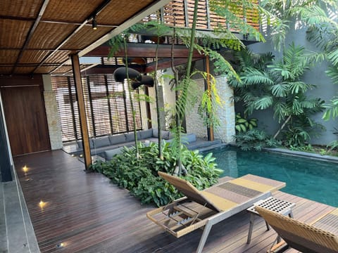 Sundeck, living room, pool and indoor garden