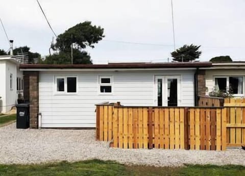 Parking bay and entrance to property