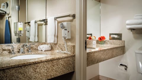 Get ready comfortably with expansive counters and bright mirrors.