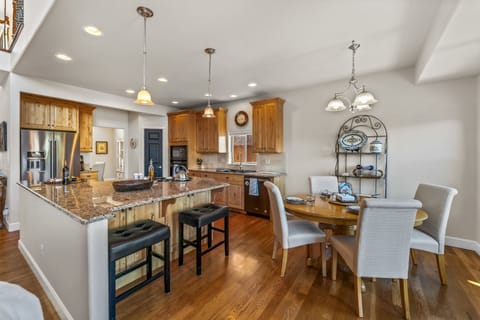 Top of the line kitchen with stainless steel appliances and granite countertops.