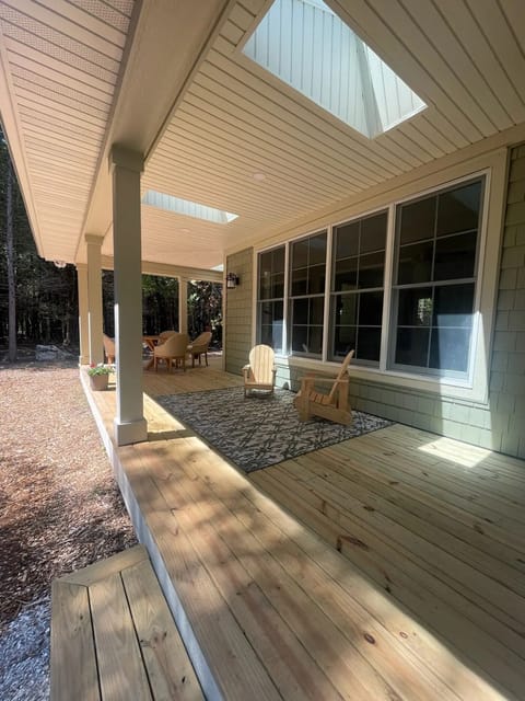 Backyard wrap around porch for relaxing and entertaining 