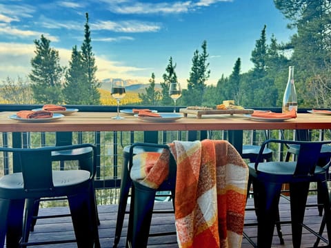 Pine & Peak Retreat is set above the treetops with sweeping mountain views and space for your whole group to gather comfortably. `Wonderful place for a big group or family.` - Chithra
