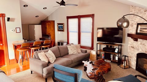 Living Room with Fireplace, TV, Surround Sound.