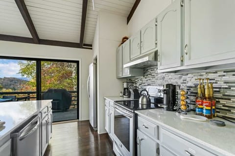 Gas Grill on the Deck and Spacious Kitchen with Stainless Appliances