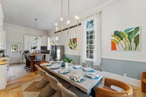 Newly renovated kitchen and dining space. 10 Seat dining table and 4 bar seats at the kitchen island. With a fully equipped kitchen, you can cook up your favorite family recipes with ease. 