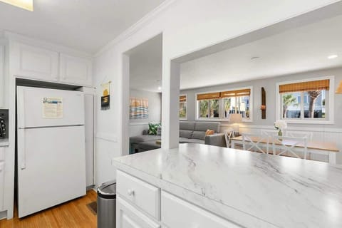 Fully equipped kitchen with everything you need to cook a meal & barstool seating for your group.