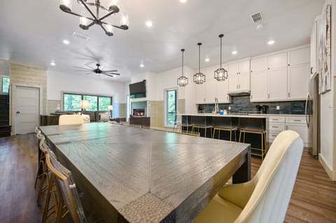 Play games, do a puzzle, or enjoy a meal with your favorite people on this extended dining table!