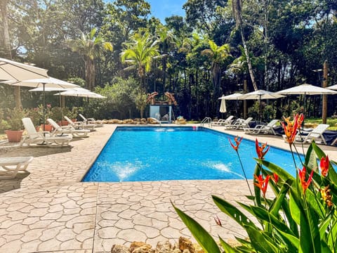 Relaxing Poolside Retreat  Our sparkling, crystal-clear pool offers the perfect escape, whether you're looking to swim, lounge, or simply soak in the sun.Whether you're enjoying a refreshing dip on a hot day or unwinding with friends.