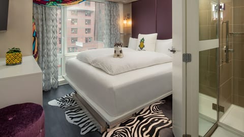 Drift off under warm bedside lights in stylish comfort.