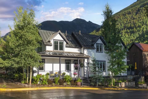 Front of the home with Ballard Mountain shadowed from the clouds in the back