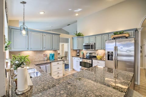 Beautiful kitchen packed with amenities.