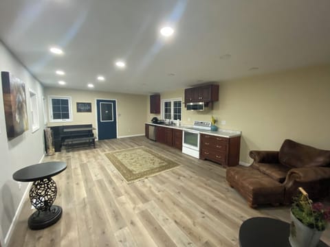Large family kitchen/living room with attached garage. Fully stocked kitchen.