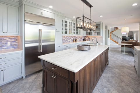 The heart of the home: a spacious, modern kitchen that flows seamlessly into the living and dining areas.