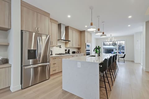 Bright and open layout, perfect for gathering while cooking.