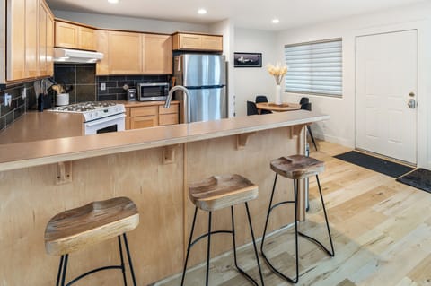 Nice island with bar stools for extra seating.